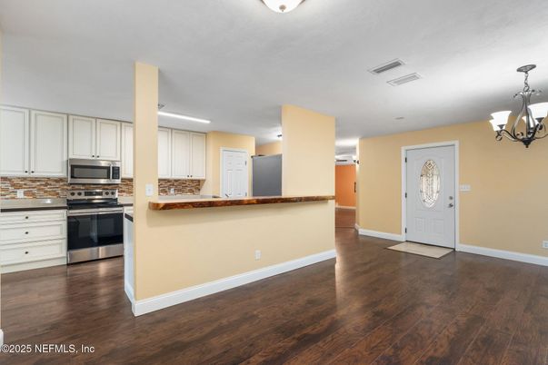 Chandelier, Interior, Kitchen, Recessed Lighting, Stainless Steel Appliances, Wood Texture Flooring