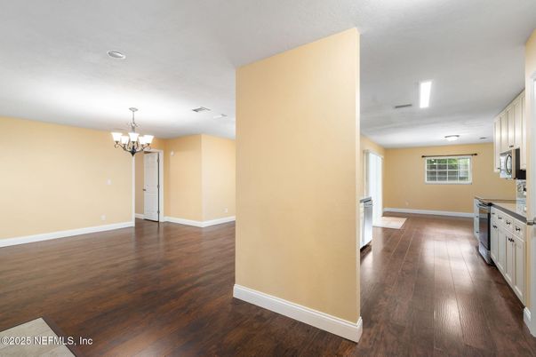Chandelier, Empty room, Interior, Kitchen, Recessed Lighting, Wood Texture Flooring