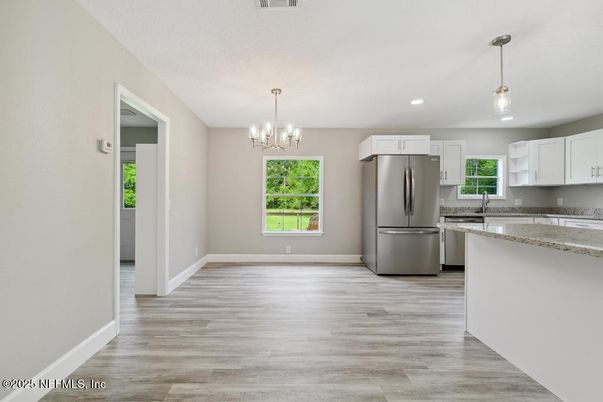 Chandelier, Interior, Kitchen, Pendant Lights, Recessed Lighting, Stainless Steel Appliances, Wood Texture Flooring