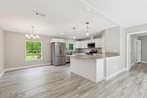Chandelier, Interior, Kitchen, Pendant Lights, Recessed Lighting, Stainless Steel Appliances, Wood Texture Flooring