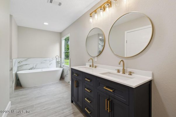 Bathroom, Dual Sink Vanities, Free Standing Baths, Interior, Recessed Lighting, Wood Texture Flooring