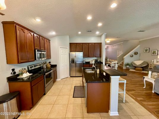 Dining room, Interior, Kitchen, Recessed Lighting, Stainless Steel Appliances, Wood Texture Flooring