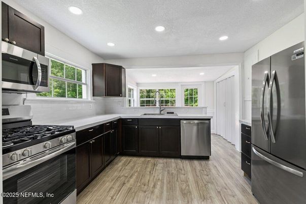 Interior, Kitchen, Recessed Lighting, Stainless Steel Appliances, Wood Texture Flooring