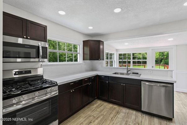 Interior, Kitchen, Recessed Lighting, Stainless Steel Appliances, Wood Texture Flooring