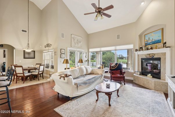 Dining room, Fireplace, Interior, Living room, Pendant Lights, Recessed Lighting, Wood Texture Flooring