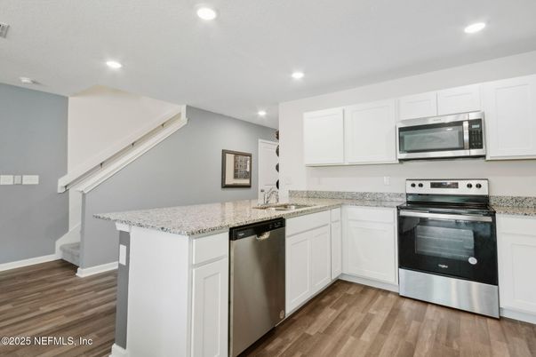 Interior, Kitchen, Recessed Lighting, Stainless Steel Appliances, Wood Texture Flooring