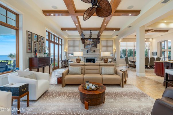 Fireplace, Interior, Living room, Recessed Lighting, Water, Wooden Beams