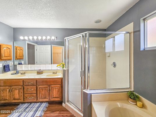 Bathroom, Dual Sink Vanities, Glass Shower, Interior, Wood Texture Flooring