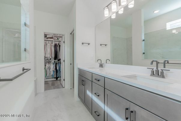 Bathroom, Dual Sink Vanities, Interior, Marble, Recessed Lighting, Walk-in Closets