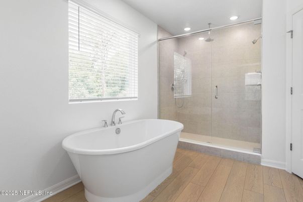 Bathroom, Free Standing Baths, Glass Shower, Interior, Recessed Lighting, Wood Texture Flooring