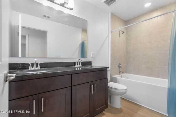Bathroom, Dual Sink Vanities, Interior, Recessed Lighting, Wood Texture Flooring