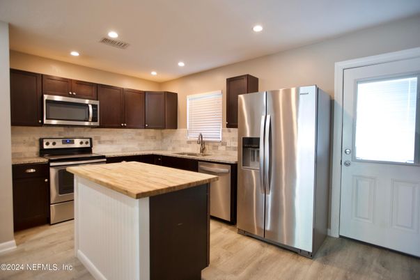 Interior, Kitchen, Recessed Lighting, Stainless Steel Appliances, Wood Texture Flooring