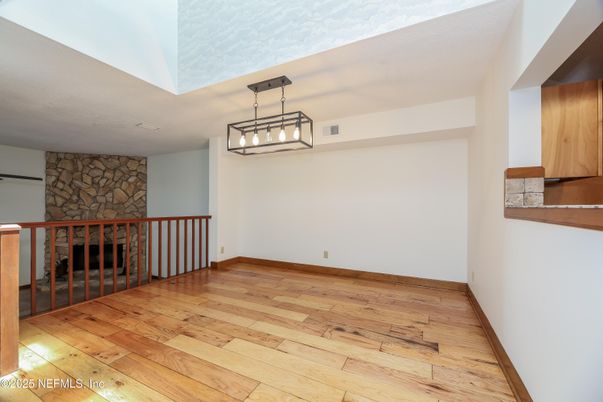 Empty room, Fireplace, Interior, Pendant Lights, Stone Walls, Wood Texture Flooring
