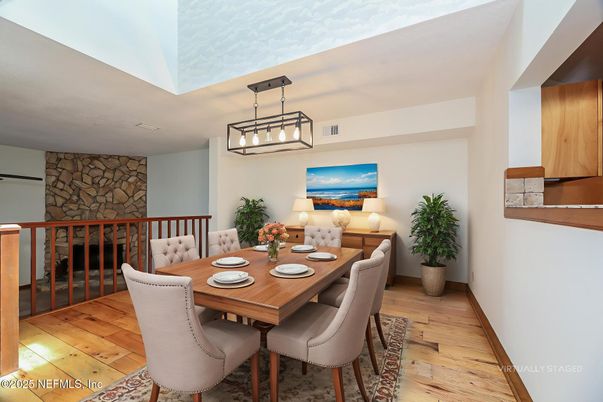 Dining room, Fireplace, Interior, Pendant Lights, Stone Walls, Wood Texture Flooring