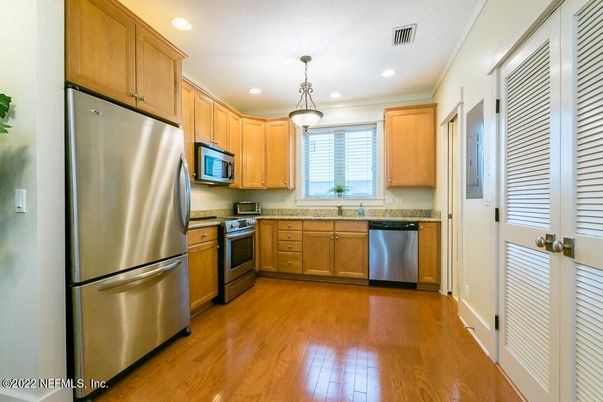 Interior, Kitchen, Pendant Lights, Recessed Lighting, Stainless Steel Appliances, Wood Texture Flooring