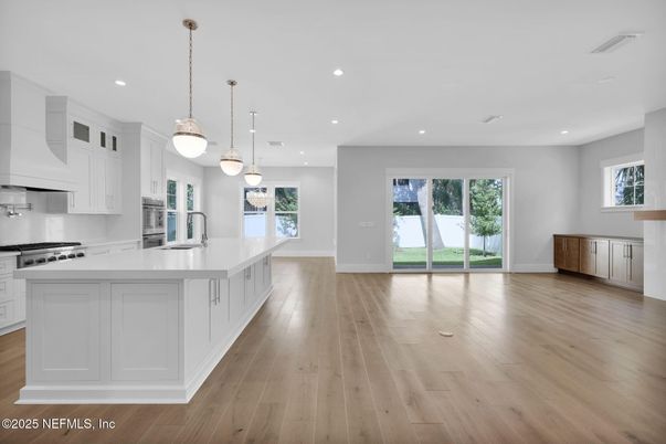 Interior, Kitchen, Pendant Lights, Recessed Lighting, Stainless Steel Appliances, Wood Texture Flooring