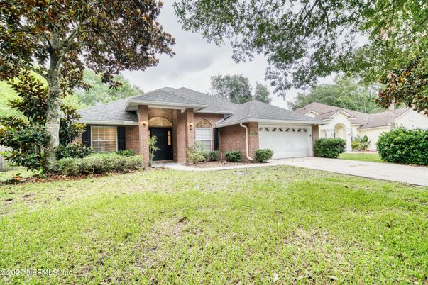 Attached, Backyard, Exterior, Facade, Brick Facade, Ranch