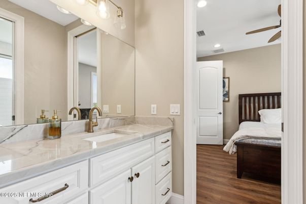 Bathroom, Bedroom, Dual Sink Vanities, Interior, Recessed Lighting, Wood Texture Flooring