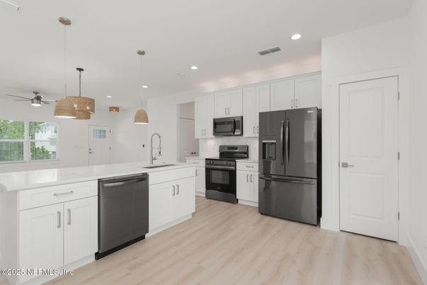 Interior, Kitchen, Pendant Lights, Recessed Lighting, Stainless Steel Appliances, Wood Texture Flooring