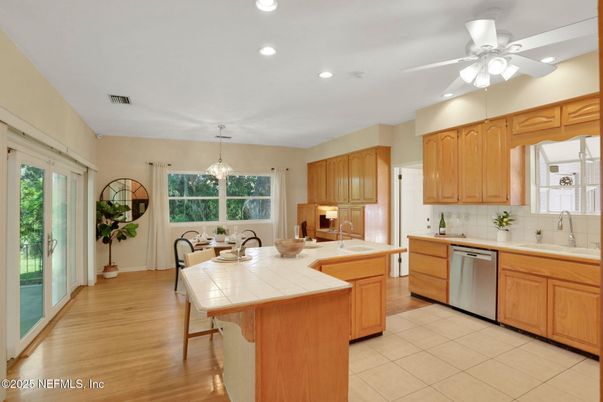 Dining room, Interior, Kitchen, Pendant Lights, Recessed Lighting, Tile Countertops, Wood Texture Flooring