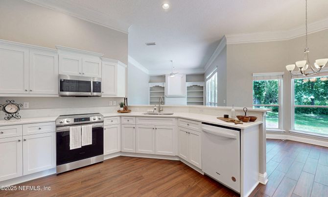 Chandelier, Interior, Kitchen, Pendant Lights, Recessed Lighting, Stainless Steel Appliances, Wood Texture Flooring