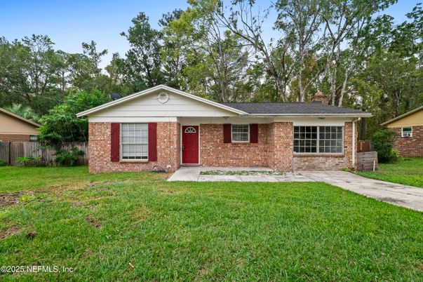 Attached, Backyard, Exterior, Facade, Brick Facade, Ranch