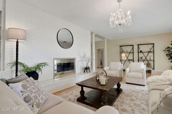 Chandelier, Fireplace, Interior, Living room, Stone Walls, Wood Texture Flooring