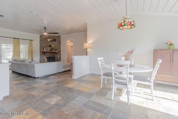Dining room, Fireplace, Interior, Living room, Pendant Lights, Stone Walls