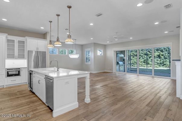 Interior, Kitchen, Pendant Lights, Recessed Lighting, Stainless Steel Appliances, Wood Texture Flooring