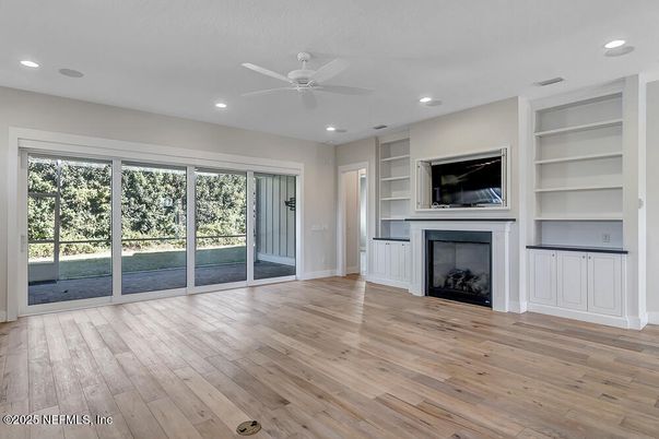Empty room, Fireplace, Interior, Recessed Lighting, Wood Texture Flooring