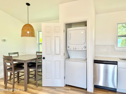 Dining room, Interior, Pendant Lights, Utility Closets, Washer, Wood Texture Flooring