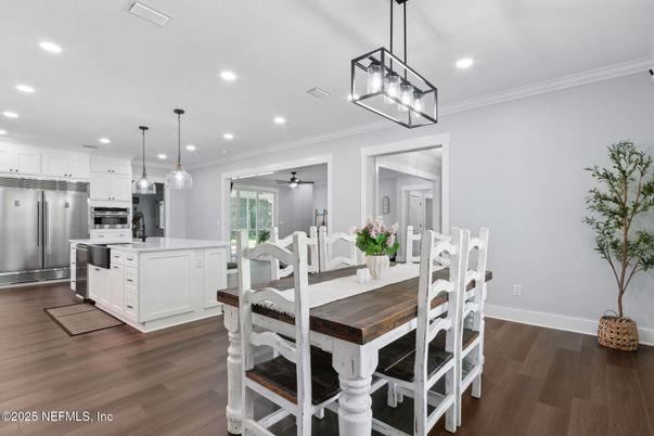 Dining room, Interior, Kitchen, Pendant Lights, Recessed Lighting, Stainless Steel Appliances, Wood Texture Flooring