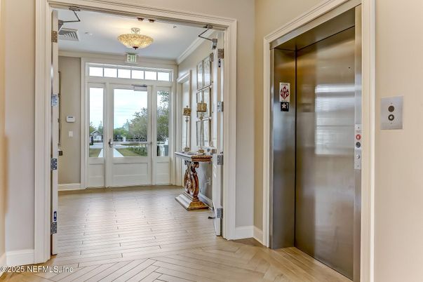 Chandelier, Elevator, Interior, Wood Texture Flooring