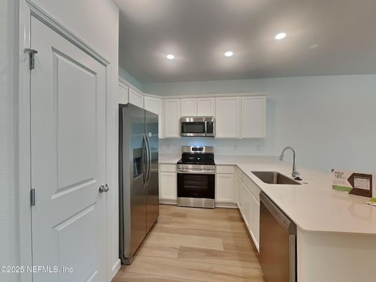 Interior, Kitchen, Recessed Lighting, Stainless Steel Appliances, Wood Texture Flooring