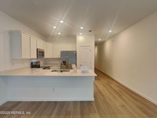 Interior, Kitchen, Recessed Lighting, Stainless Steel Appliances, Wood Texture Flooring