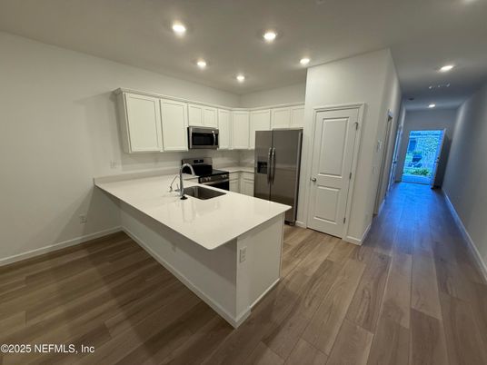 Interior, Kitchen, Recessed Lighting, Stainless Steel Appliances, Wood Texture Flooring