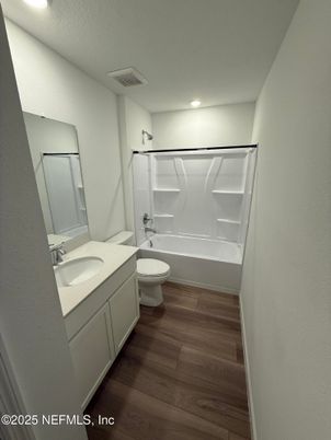Bathroom, Dual Sink Vanities, Interior, Recessed Lighting, Wood Texture Flooring