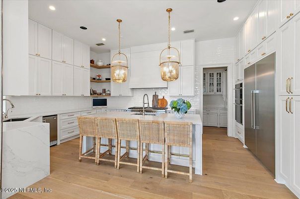 Interior, Kitchen, Pendant Lights, Recessed Lighting, Stainless Steel Appliances, Wood Texture Flooring