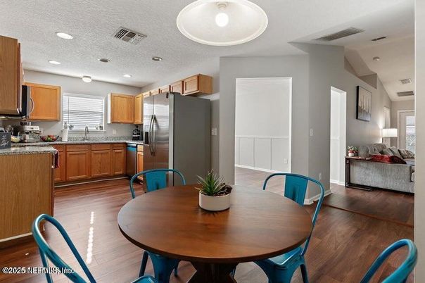 Dining room, Interior, Kitchen, Recessed Lighting, Stainless Steel Appliances, Wood Texture Flooring