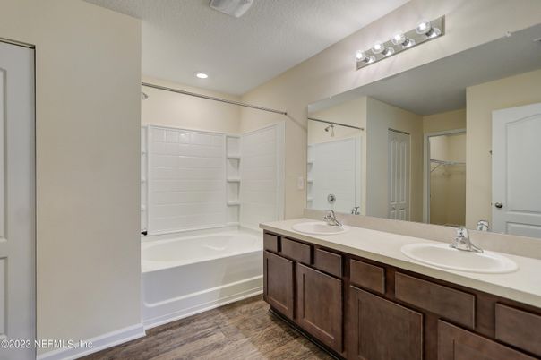 Bathroom, Dual Sink Vanities, Interior, Recessed Lighting, Wood Texture Flooring