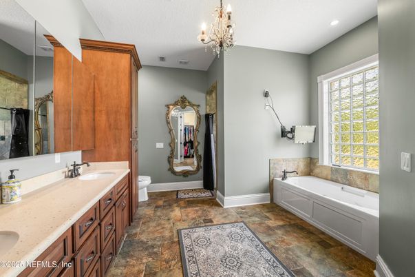Bathroom, Chandelier, Dual Sink Vanities, Interior, Recessed Lighting