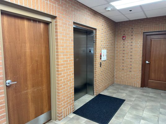 Elevator, Interior, Recessed Lighting, Stone Walls