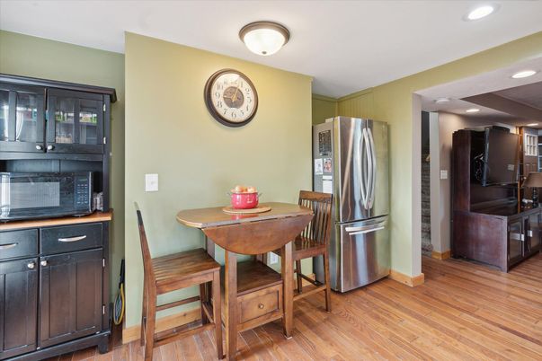 Dining room, Interior, Kitchen, Recessed Lighting, Stainless Steel Appliances, Wood Texture Flooring