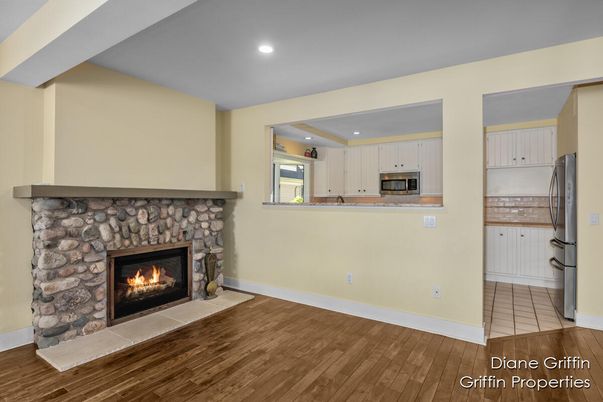 Fireplace, Interior, Kitchen, Recessed Lighting, Wood Texture Flooring