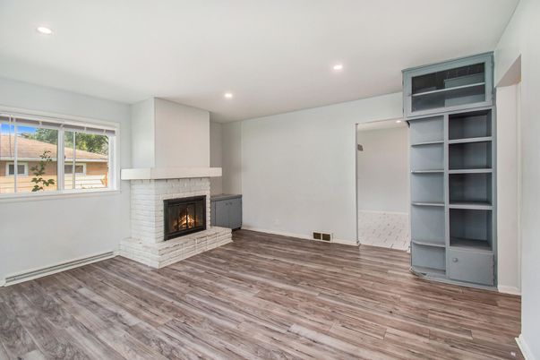 Empty room, Fireplace, Interior, Recessed Lighting, Wood Texture Flooring