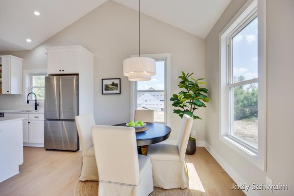 Dining room, Interior, Kitchen, Pendant Lights, Recessed Lighting, Stainless Steel Appliances, Wood Texture Flooring