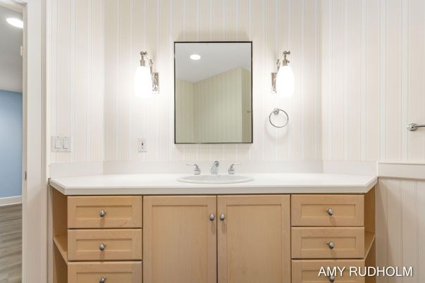 Bathroom, Dual Sink Vanities, Interior, Pendant Lights, Recessed Lighting, Wood Texture Flooring