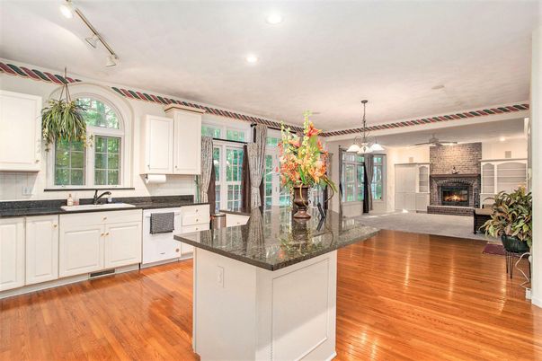 Fireplace, Interior, Kitchen, Pendant Lights, Recessed Lighting, Stone Walls, Wood Texture Flooring