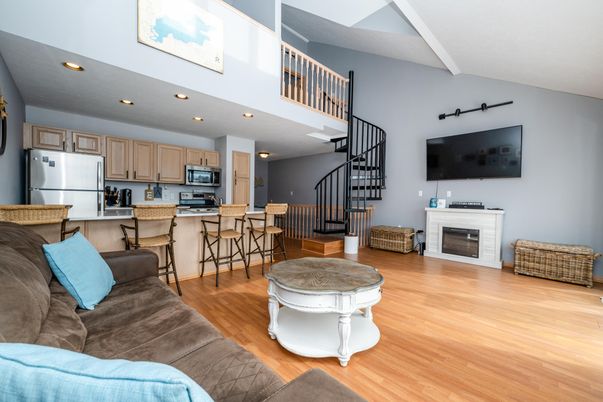 Fireplace, Interior, Kitchen, Living room, Recessed Lighting, Stainless Steel Appliances, Wood Texture Flooring