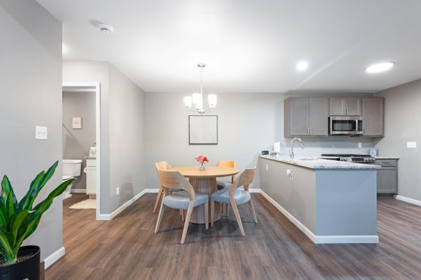 Chandelier, Dining room, Interior, Kitchen, Recessed Lighting, Stainless Steel Appliances, Wood Texture Flooring